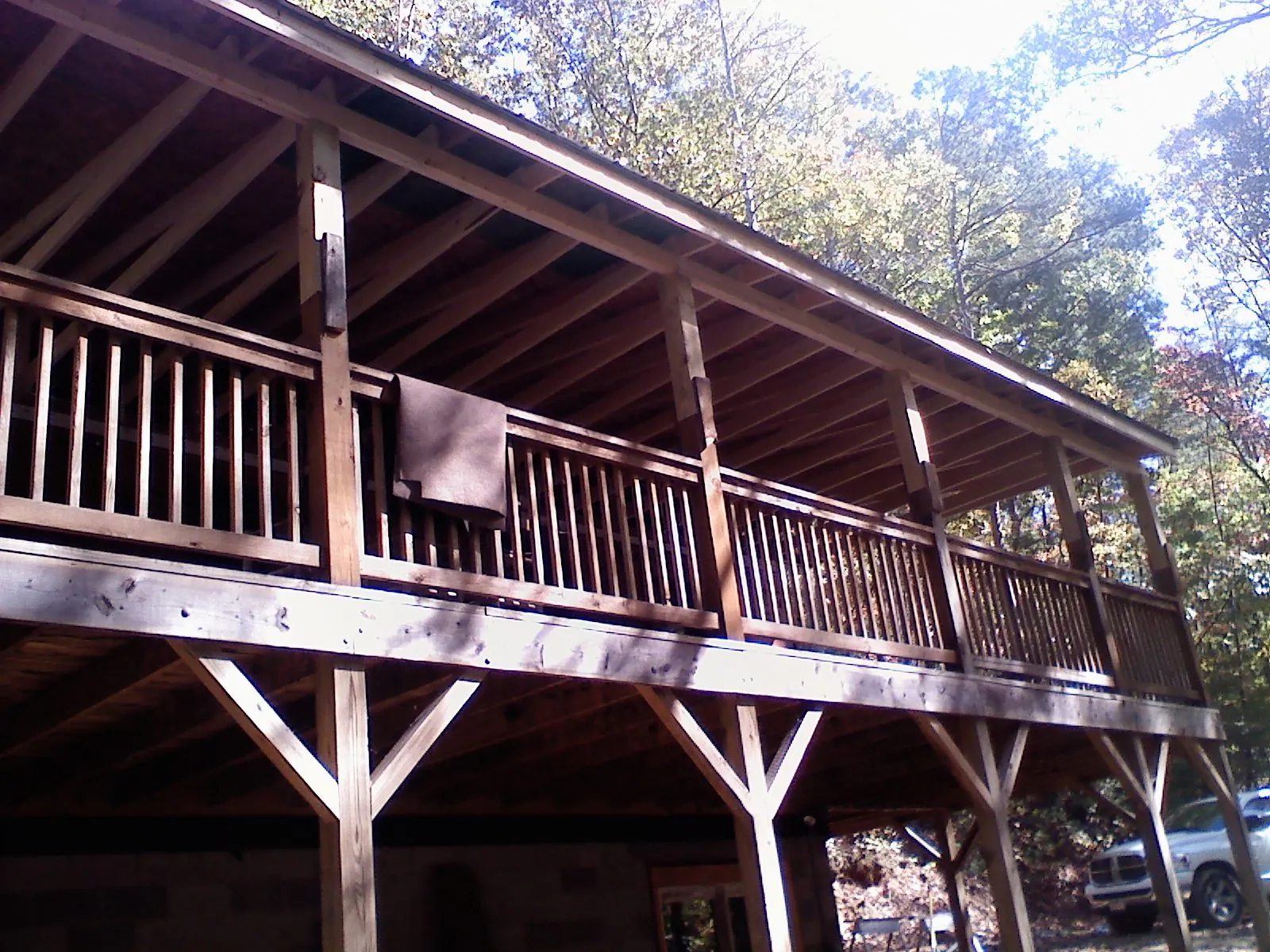 Timber framing under a new elevated porch and deck — Roof Leak Repair in Cutchogue by Roofing Brothers
